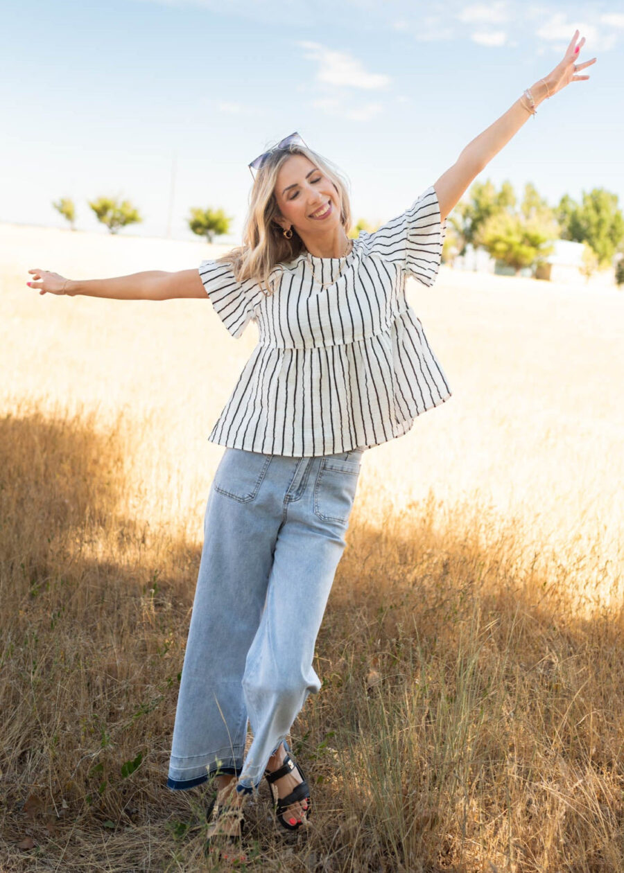 Brynn Black Striped Peplum Top